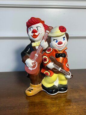 Plasterware musical clowns figurine